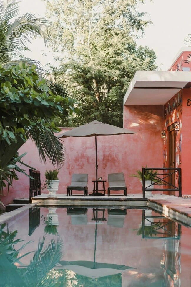 pool and chairs red call on the back